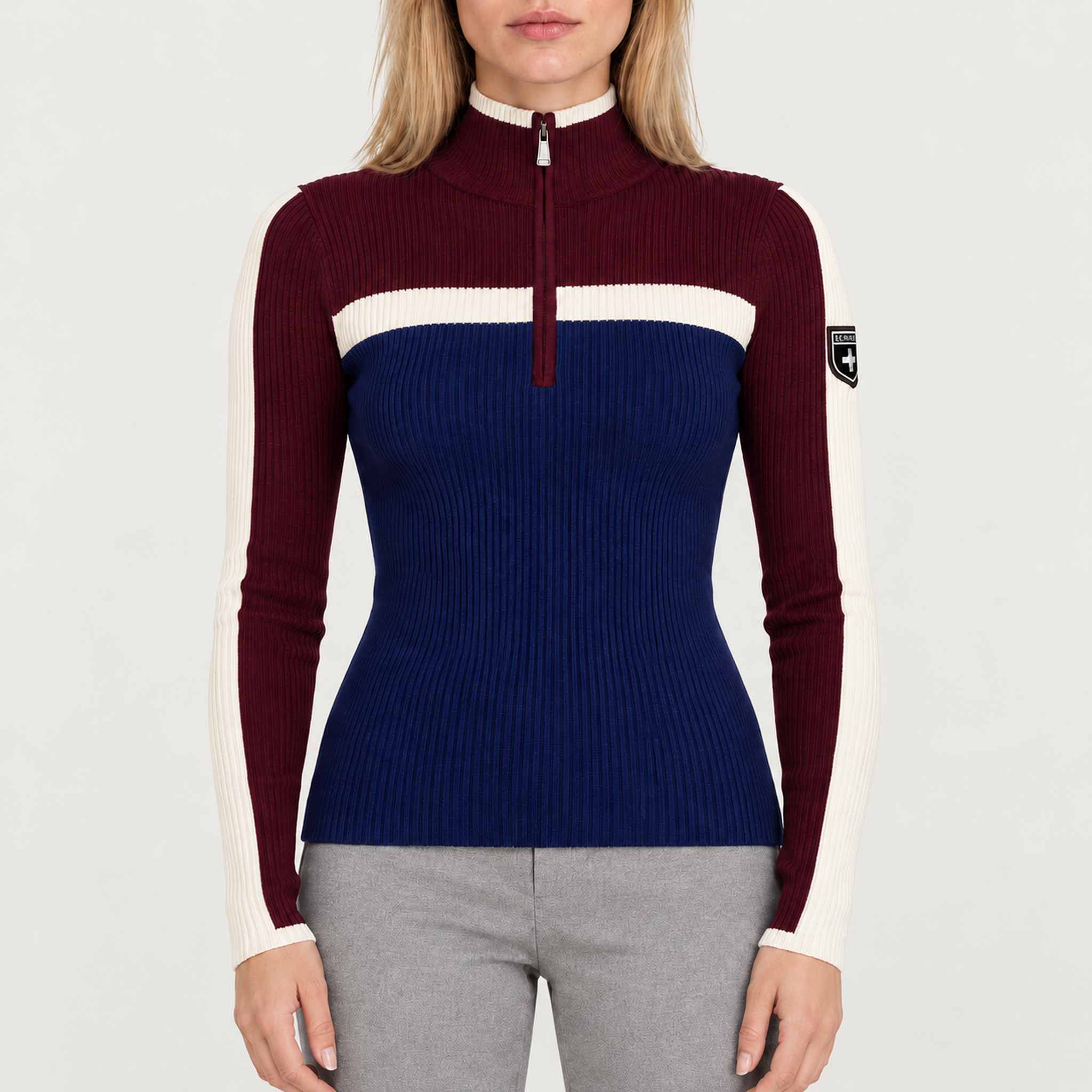 Model wearing Alp n Rock women's Ali Rib Sweater in Deep Blue/Deep Red, front view.