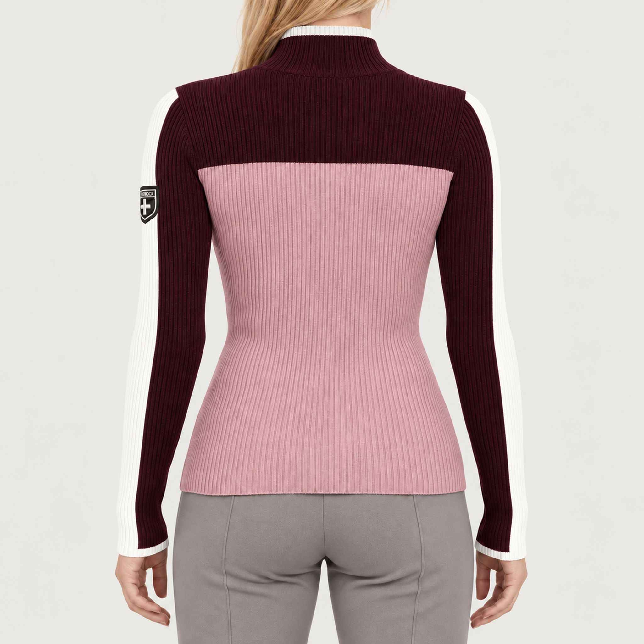 Model wearing Alp n Rock women's Ali Rib Sweater in Smokey Rose/Cabernet, back view.