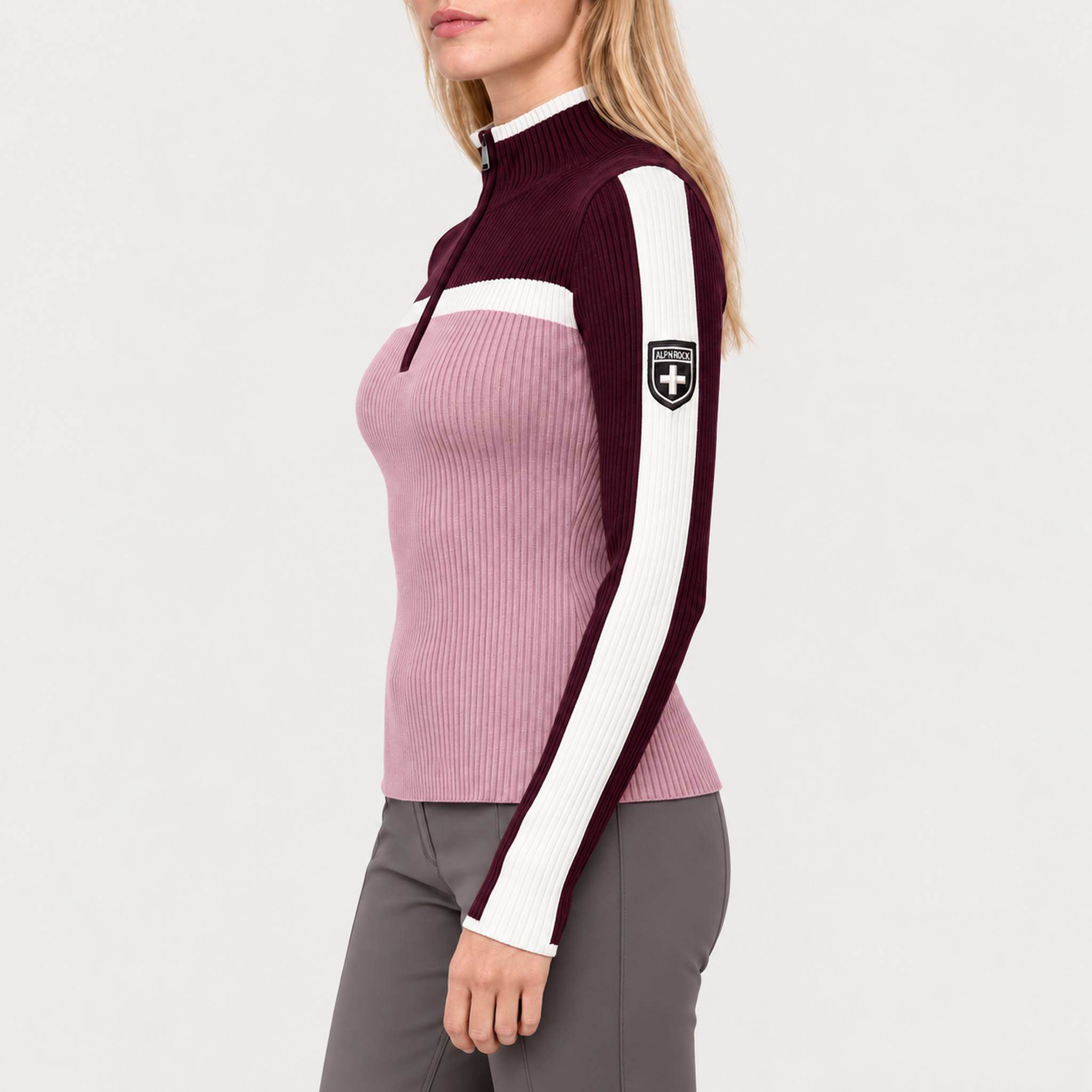 Model wearing Alp n Rock women's Ali Rib Sweater in Smokey Rose/Cabernet, side view.