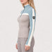 Model wearing Alp n Rock women's Ali Rib Sweater in Stone/Silver Blue, side view.