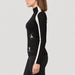 Alp n Rock women's Ashna Mockneck in black, side view on model.