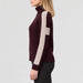 Alp n Rock women's Killian Sweater in cabernet, side view on model.