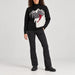 Alp n Rock women's Portia Ski Sweater in black, full outfit with black softshell ski pants.