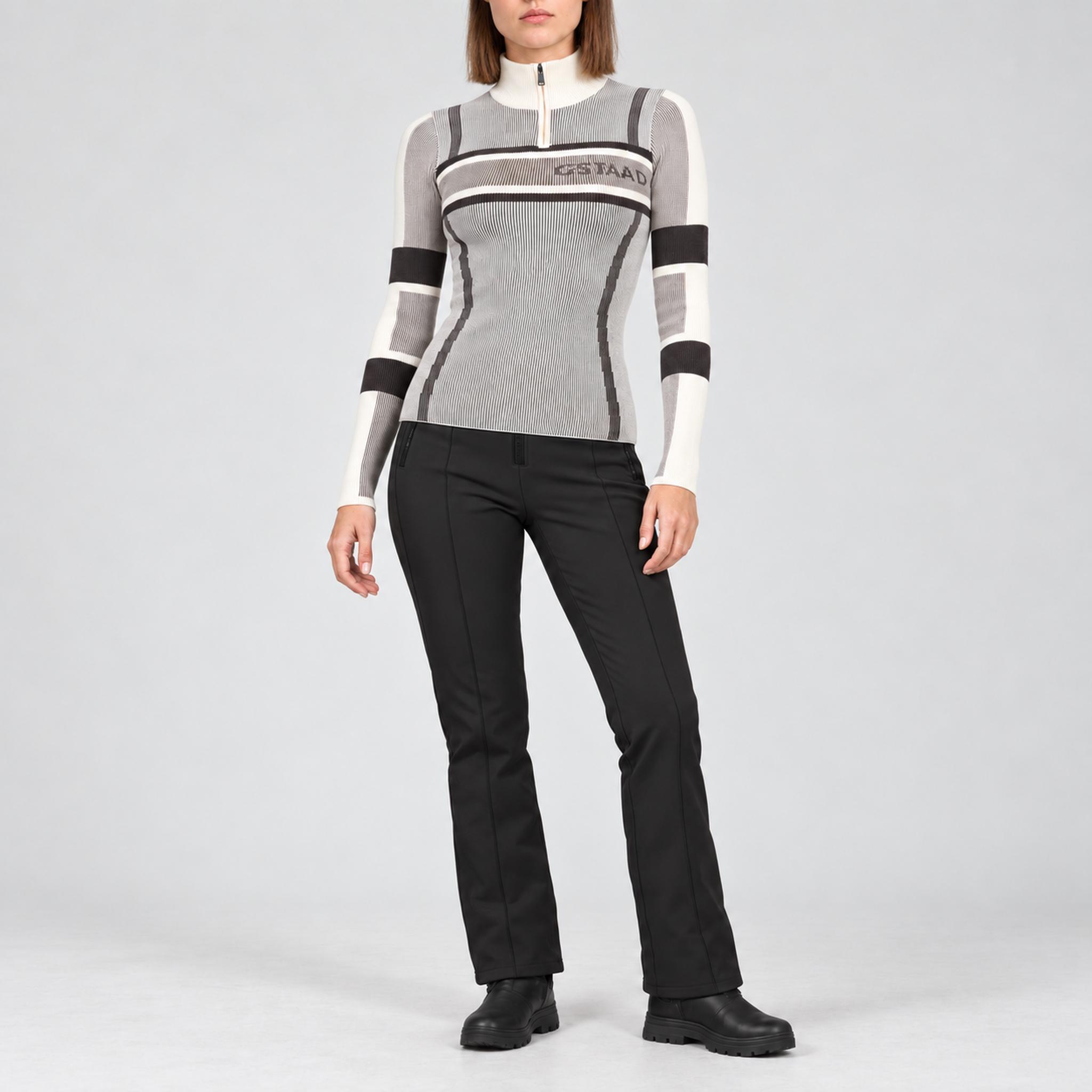 Alp n Rock women's Sylvia Zip Sweater in ivory, full outfit with black softshell ski pants.