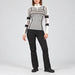 Alp n Rock women's Sylvia Zip Sweater in ivory, full outfit with black softshell ski pants.