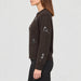 Alp n Rock women's Talia Embroidered Skier Sweater in coffee, side view on model.