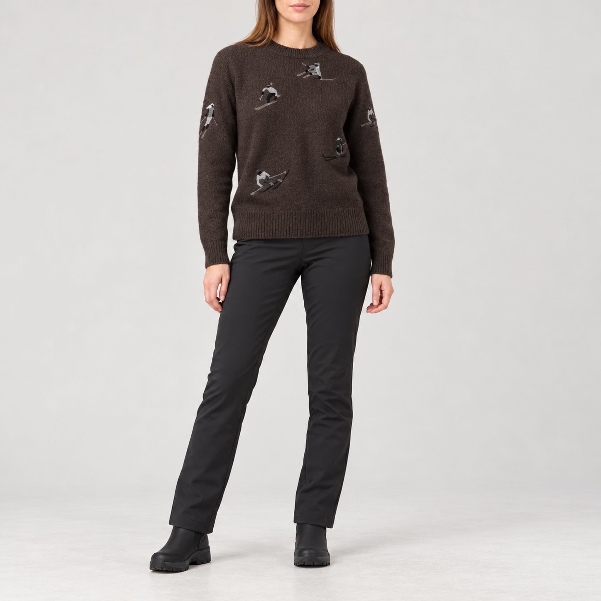 Alp n Rock women's Talia Embroidered Skier Sweater in coffee, full outfit with black softshell ski pants.