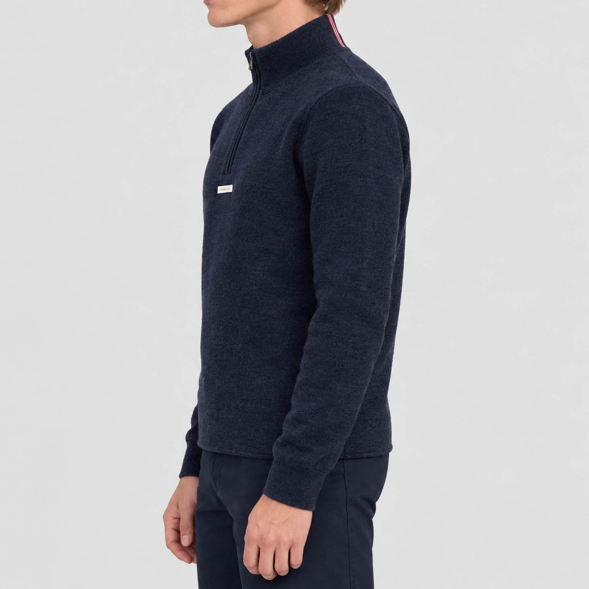 Amundsen Boiled Half Zip in Faded Navy, side view on model.