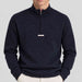 Amundsen Boiled Half Zip in Faded Navy, close-up fabric detail on model.
