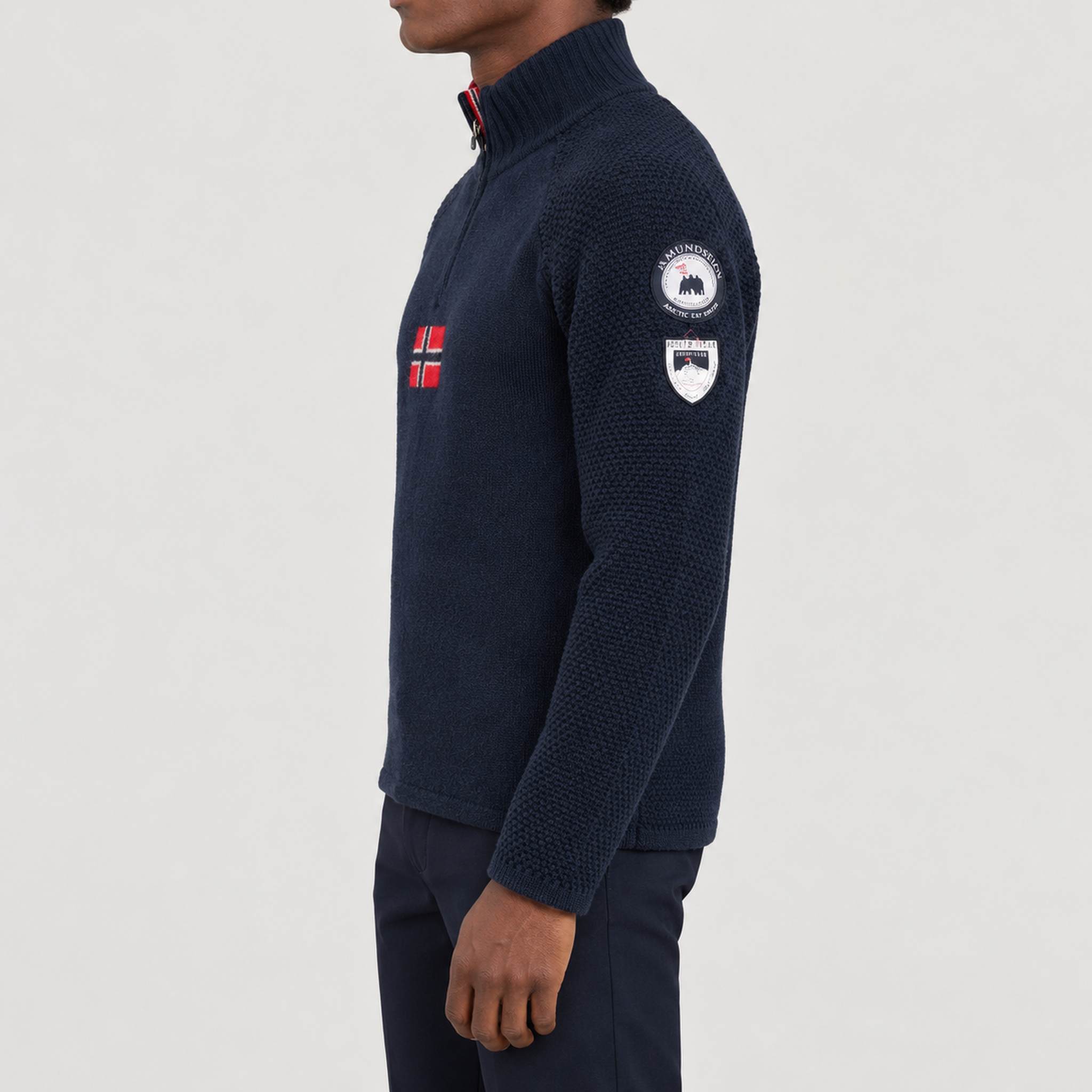 Amundsen Boiled Ski Flag Sweater in Faded Navy, side view on model.