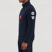 Amundsen Boiled Ski Flag Sweater in Faded Navy, side view on model.