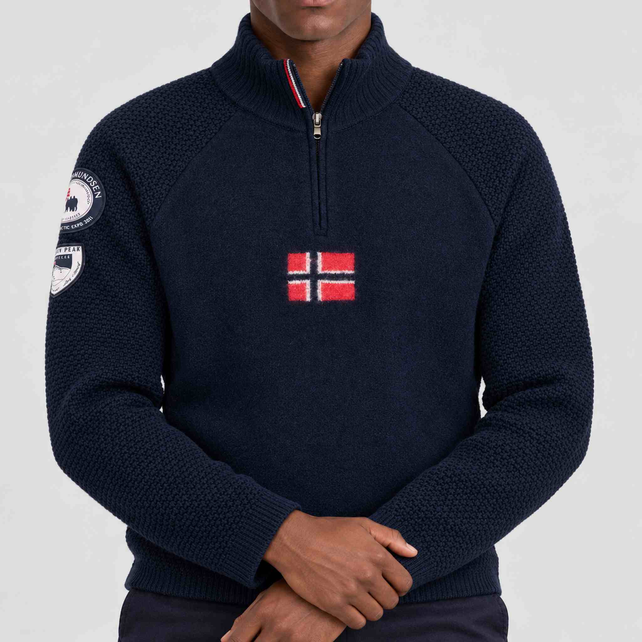Amundsen Boiled Ski Flag Sweater in Faded Navy, close-up fabric detail on model.