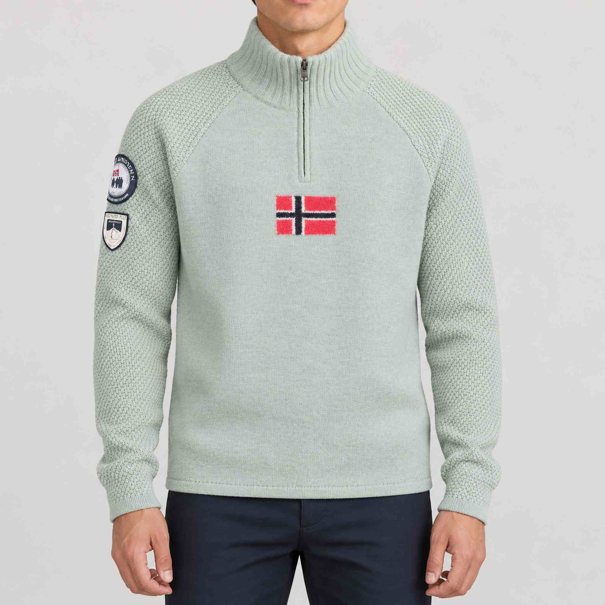 Amundsen Boiled Ski Flag Sweater in Faded Woad Green/Norge, front view on model.