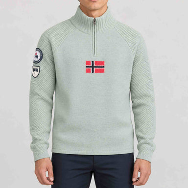 Amundsen Boiled Ski Flag Sweater in Faded Woad Green/Norge, front view on model.