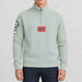 Amundsen Boiled Ski Flag Sweater in Faded Woad Green/Norge, front view on model.