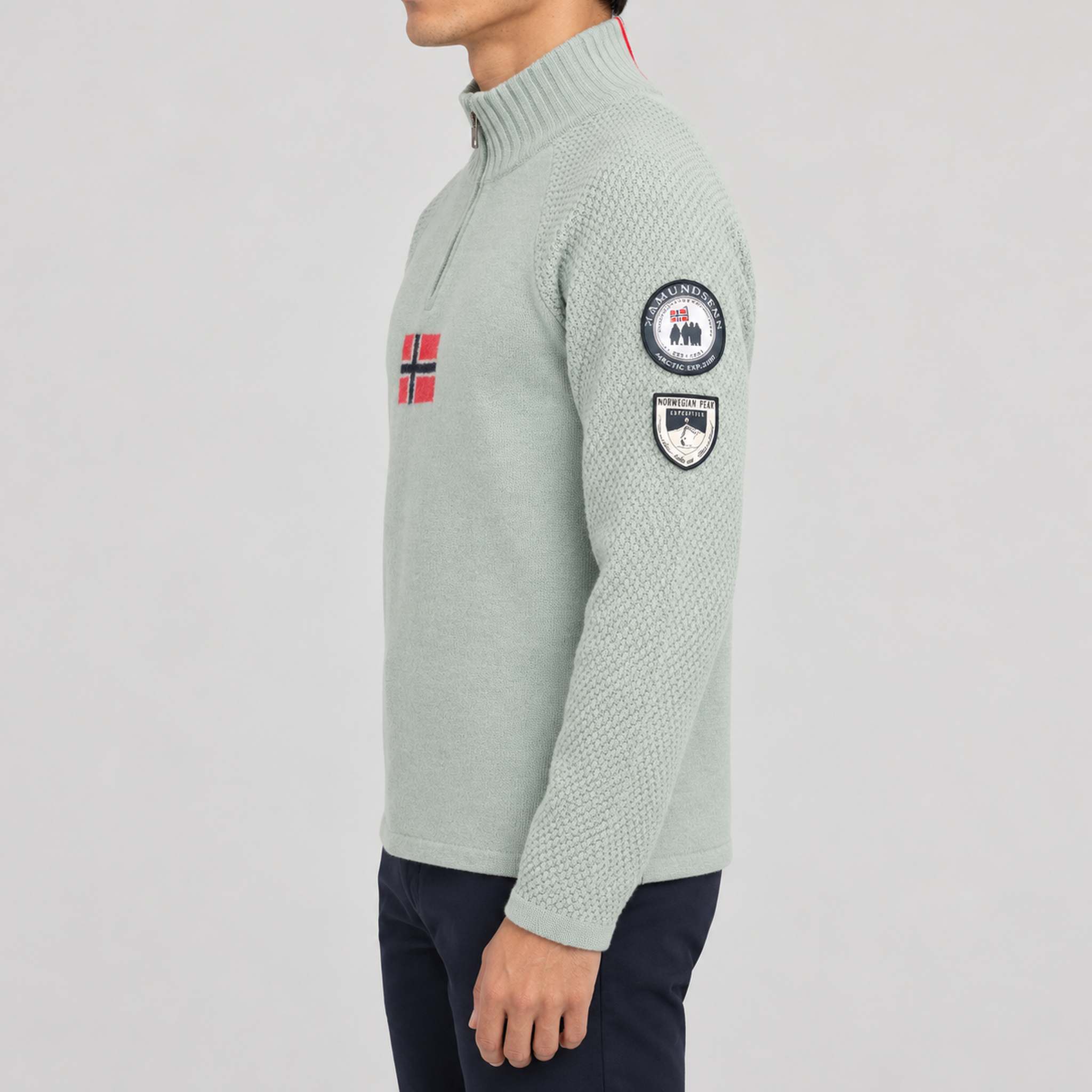 Amundsen Boiled Ski Flag Sweater in Faded Woad Green/Norge, side view on model.