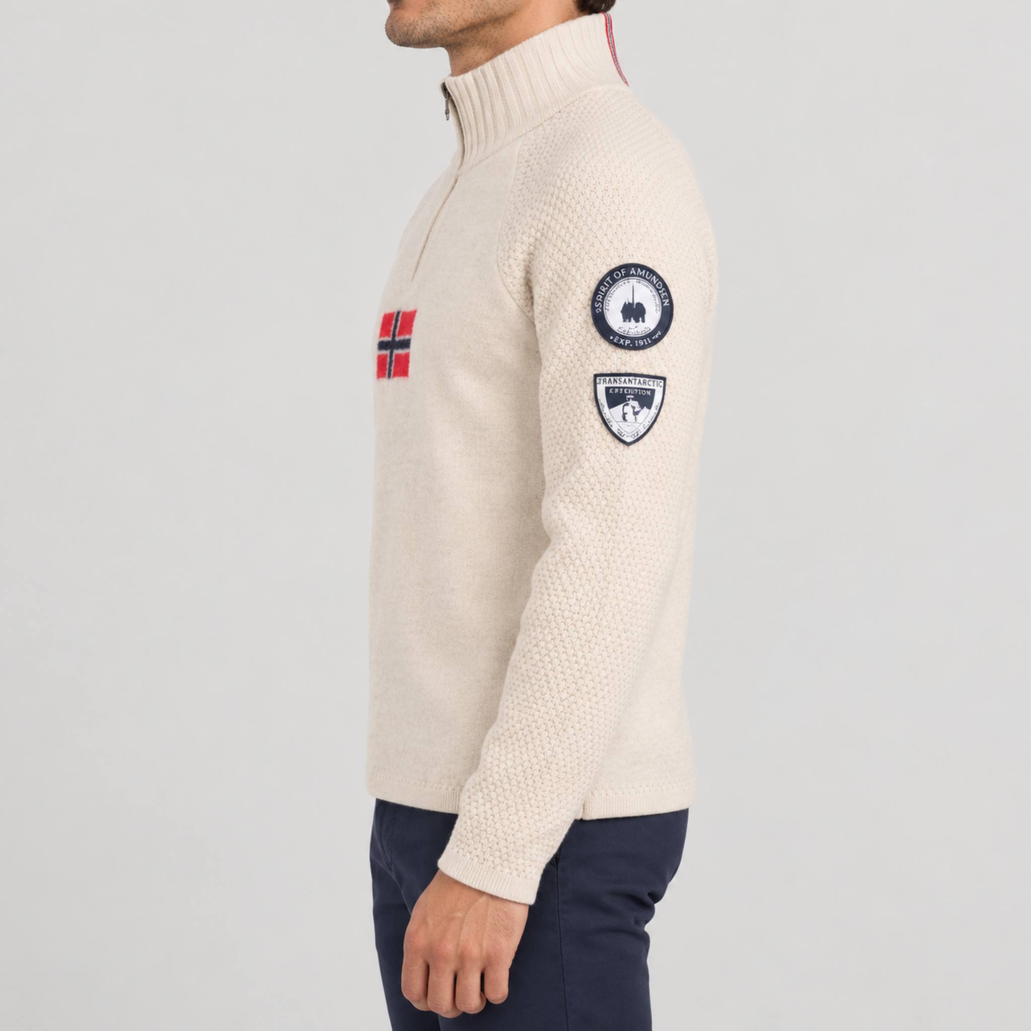 Amundsen Boiled Ski Flag Sweater in Oatmeal, side view on model.