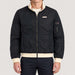 Amundsen men's Breguet Waxed Jacket in Faded Navy, model front.