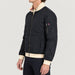 Amundsen men's Breguet Waxed Jacket in Faded Navy, model side.