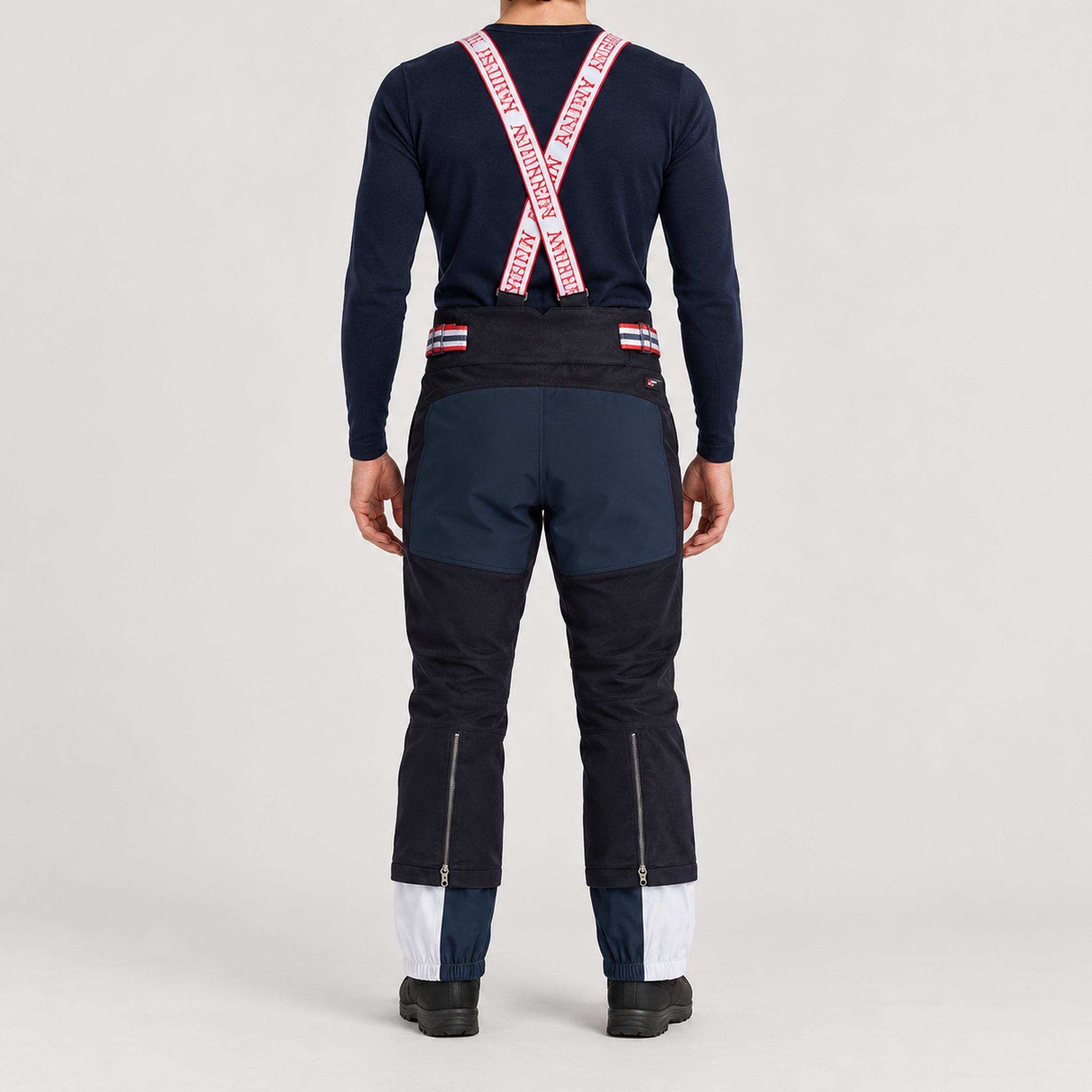 Amundsen Concord Ski Pants in Faded Navy, back view on model.
