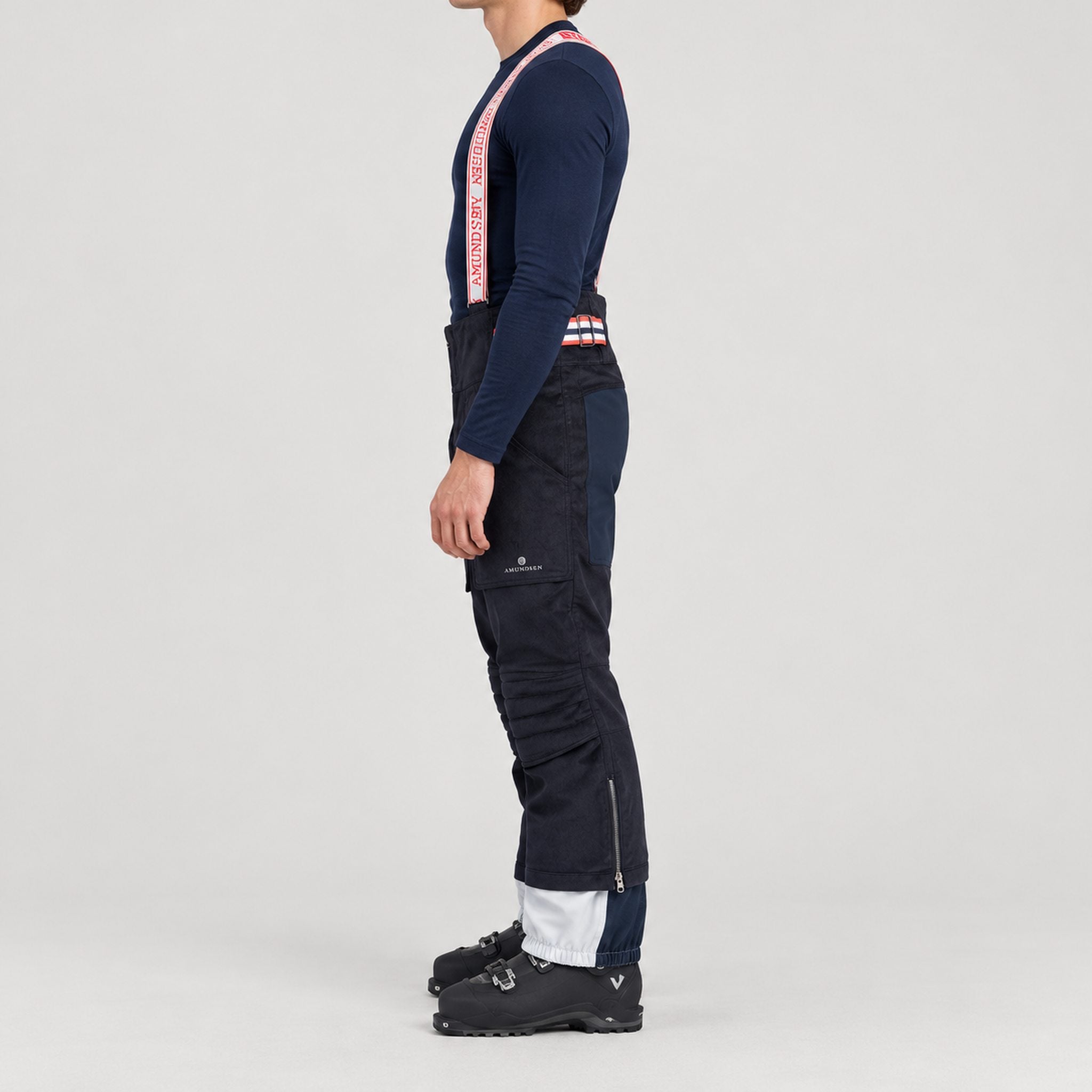 Amundsen Concord Ski Pants in Faded Navy, side view on model.