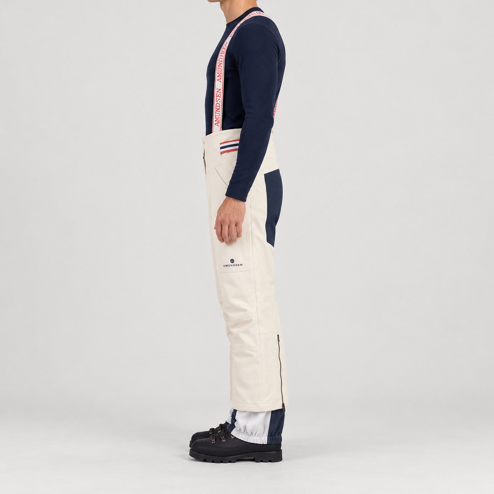 Amundsen Concord Ski Pants in Natural, side view on model.