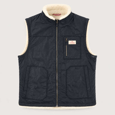 Amundsen Harvester Reverso Waxed Vest, front product view, navy waxed side.