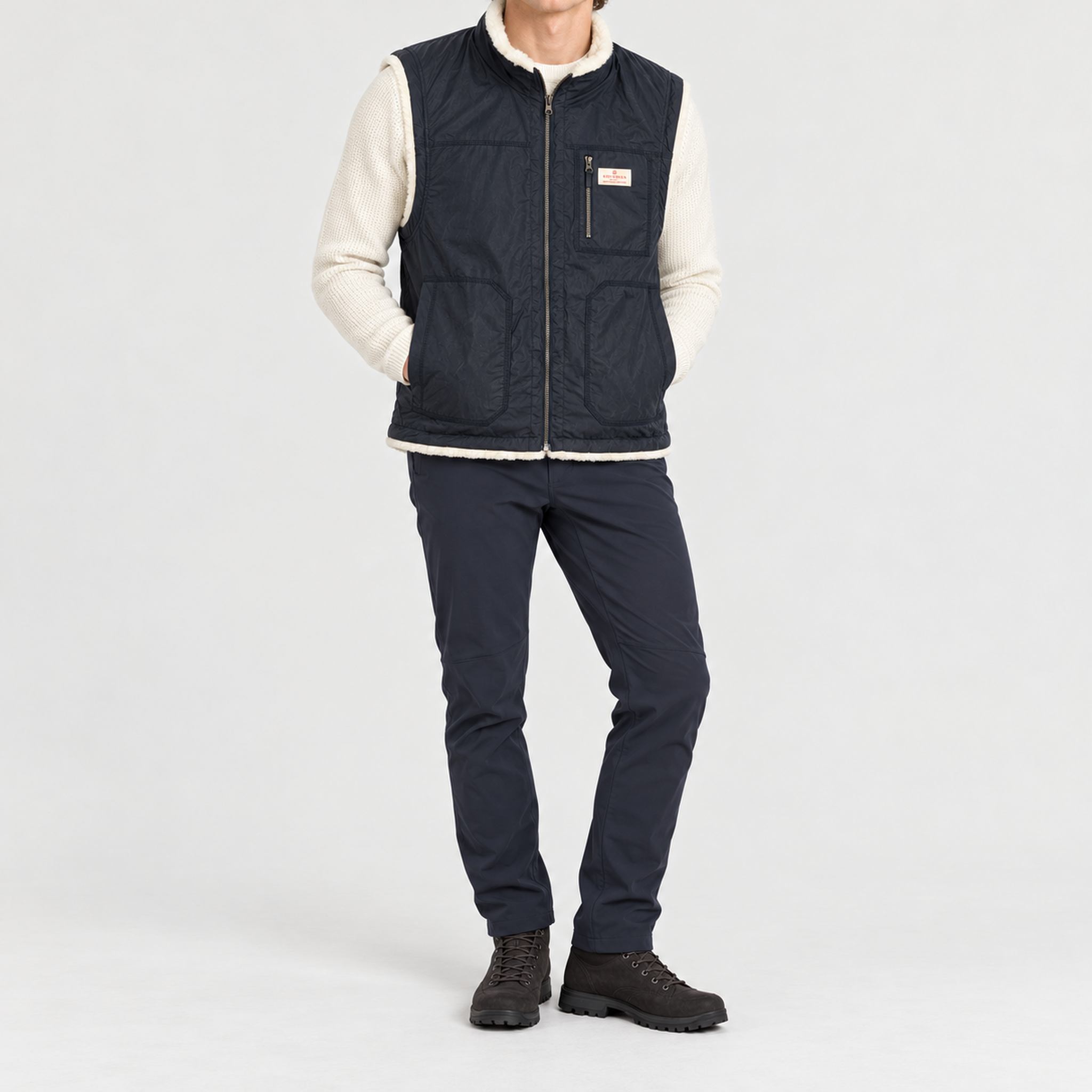 Amundsen Harvester Reverso Waxed Vest, full outfit view on model, navy waxed side.