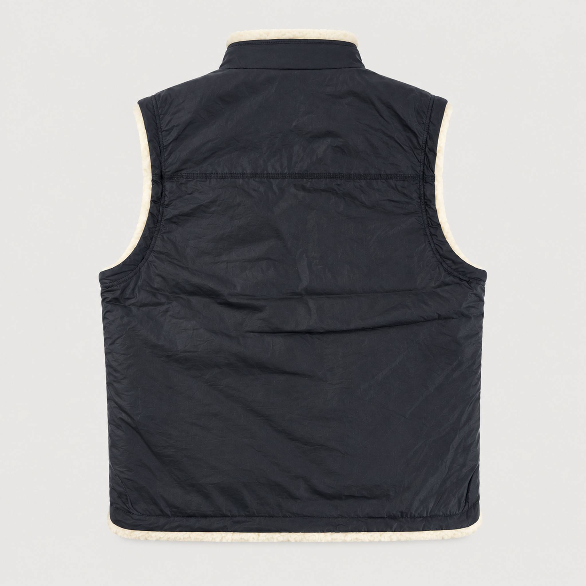 Amundsen Harvester Reverso Waxed Vest, back product view, navy waxed side.