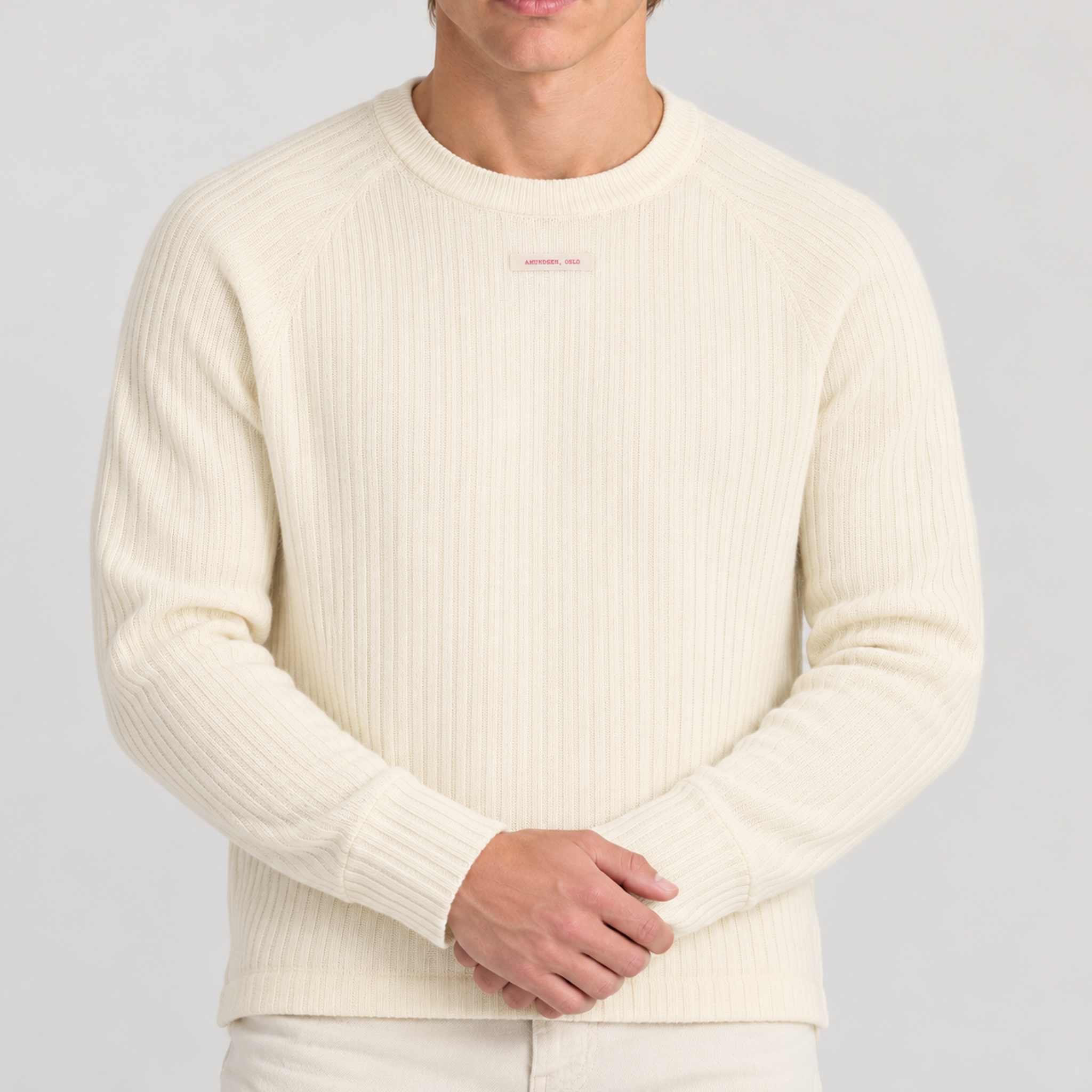 Amundsen Hero’s Hide Crew Neck, close-up fabric detail on model.