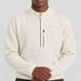 Amundsen Hut Half Zip in Oatmeal, close-up fabric detail on model.