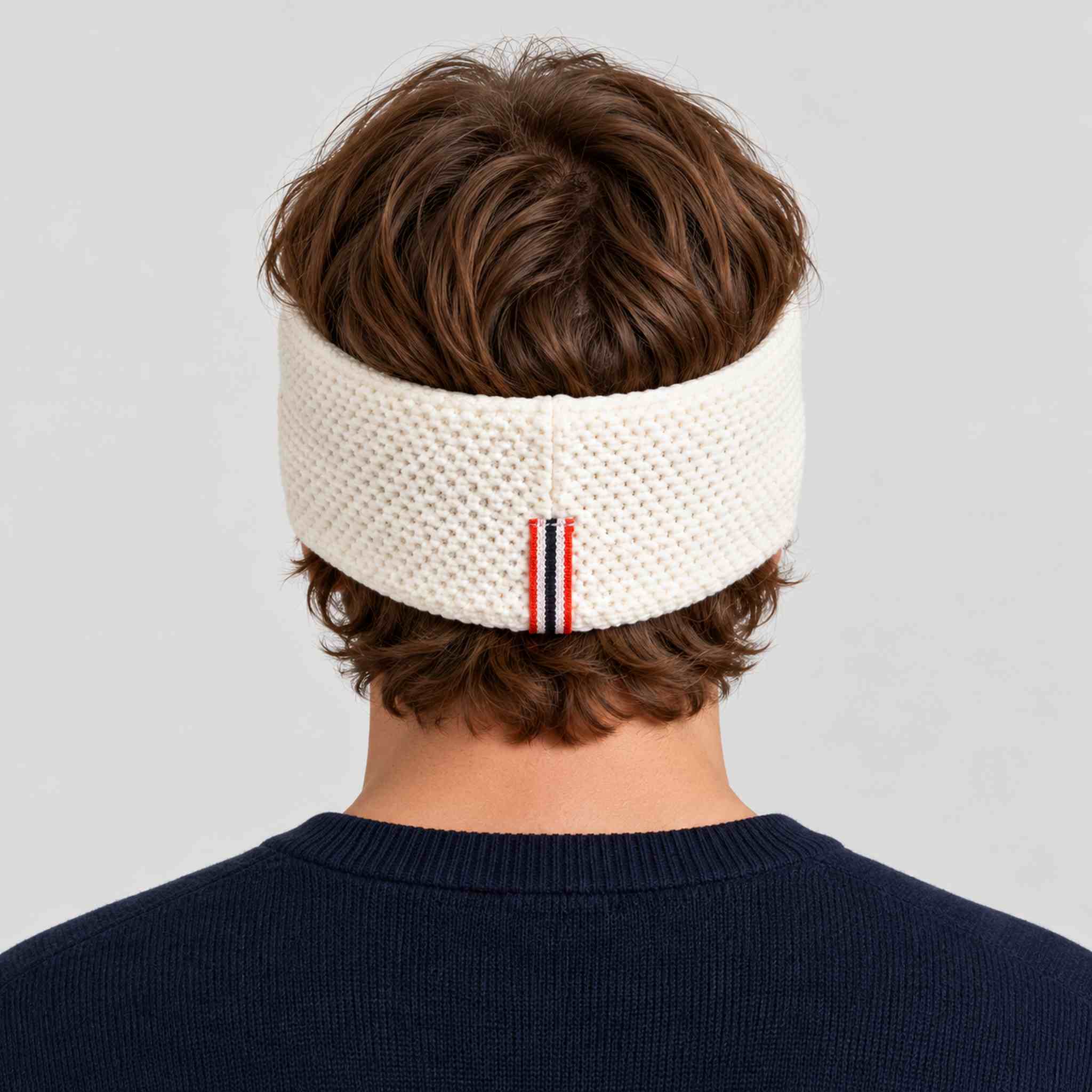 Amundsen Antarctica Headband in White, back view worn by a male model.