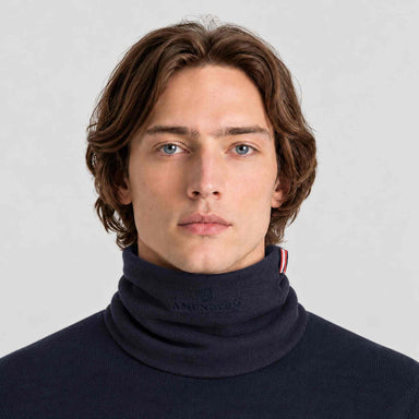 Amundsen Neckwarmer in Faded Navy, front view worn by a male model.