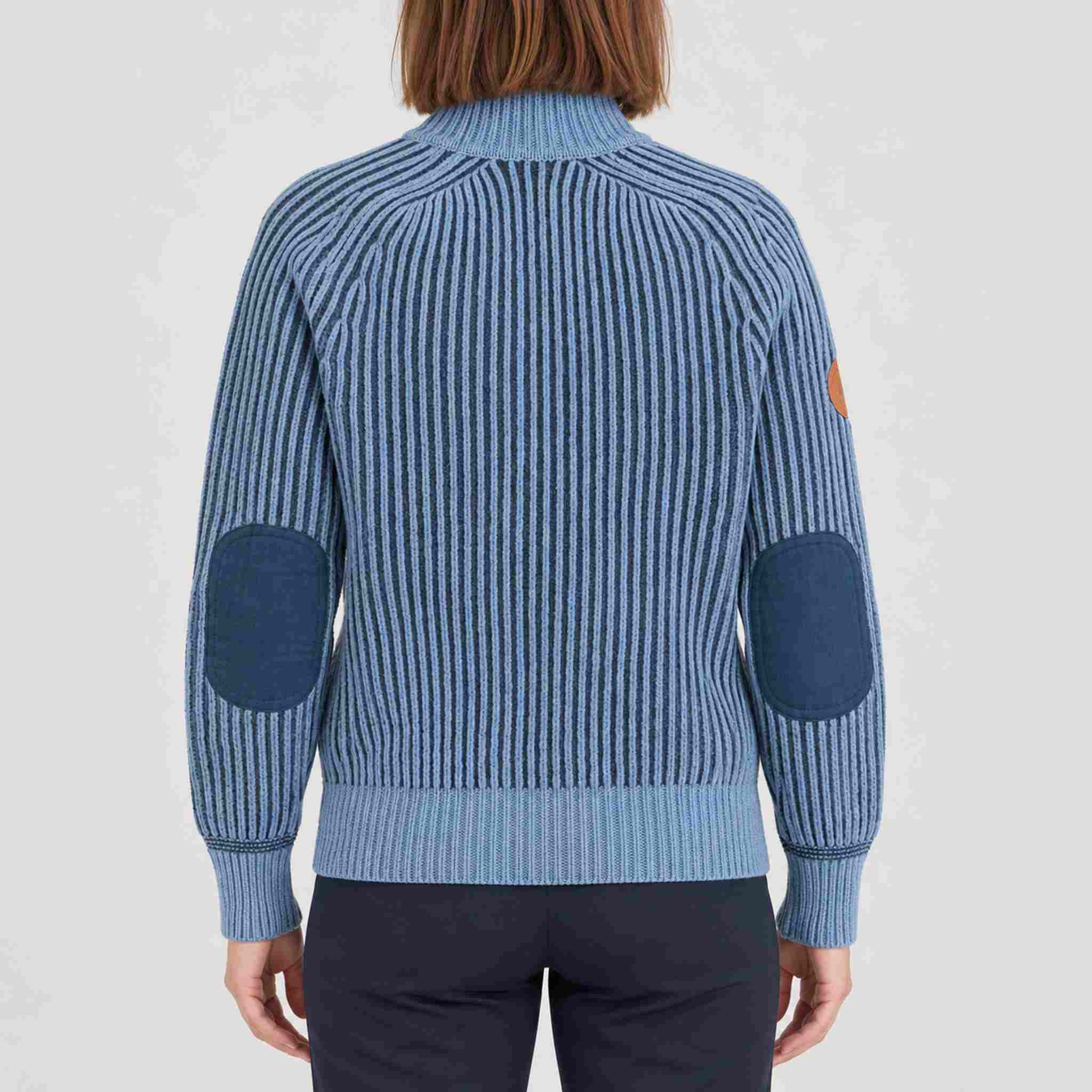 Amundsen Gard Sweater in Fjord Blue, back view on model.