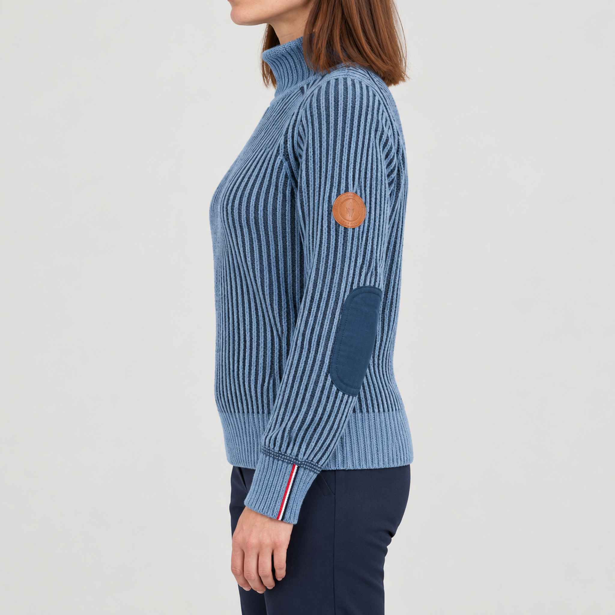 Amundsen Gard Sweater in Fjord Blue, side view on model.