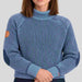 Amundsen Gard Sweater in Fjord Blue, close-up fabric detail on model.