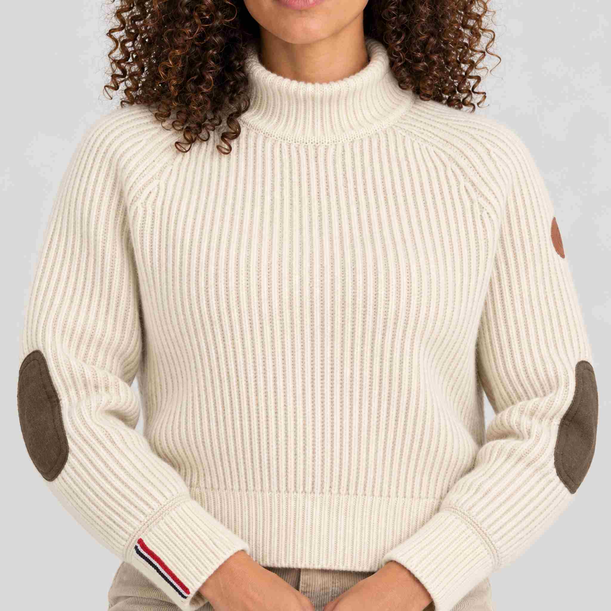 Amundsen Gard Sweater in Natural, close-up fabric detail on model.