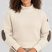 Amundsen Gard Sweater in Natural, close-up fabric detail on model.