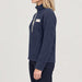 Amundsen Hut Half Zip in Faded Navy, side view on model.