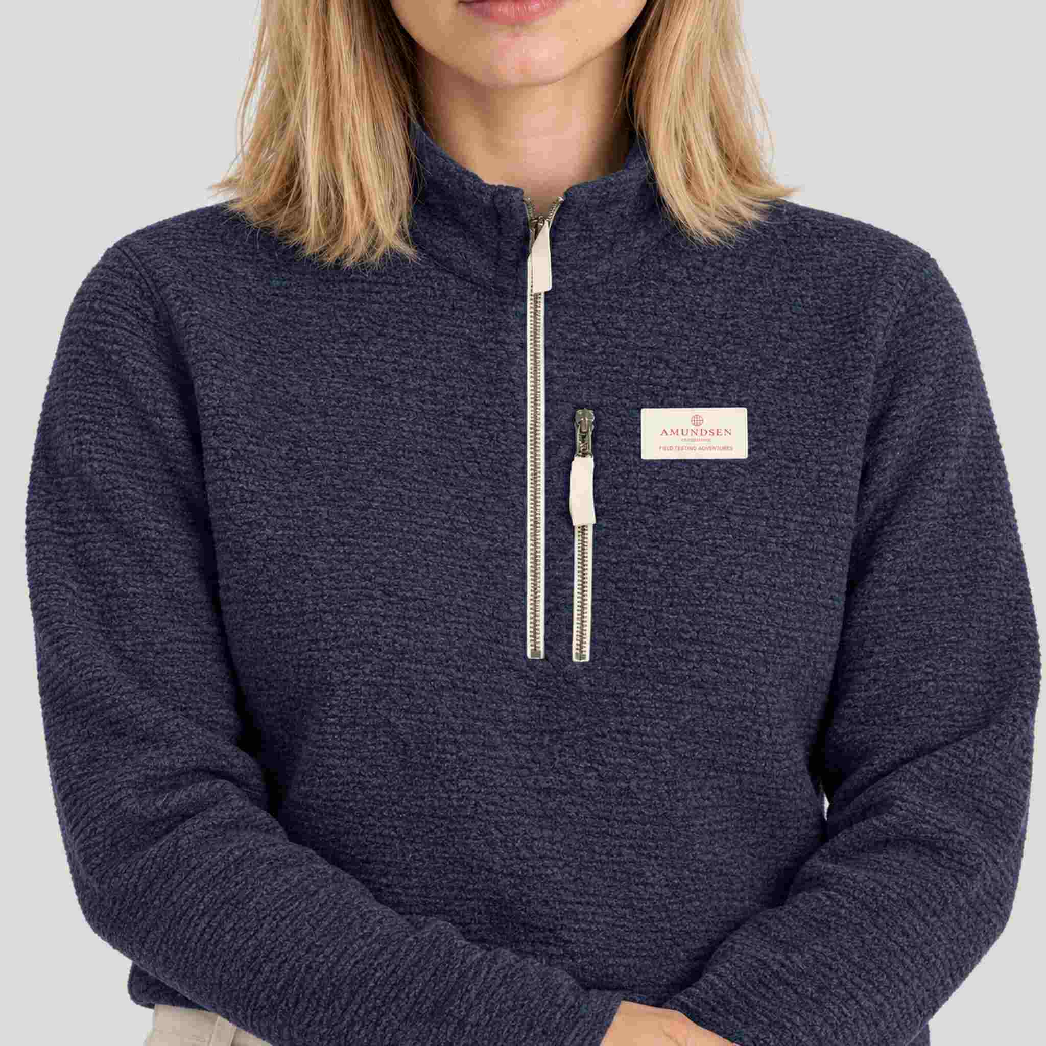 Amundsen Hut Half Zip in Faded Navy, close-up fabric detail on model.