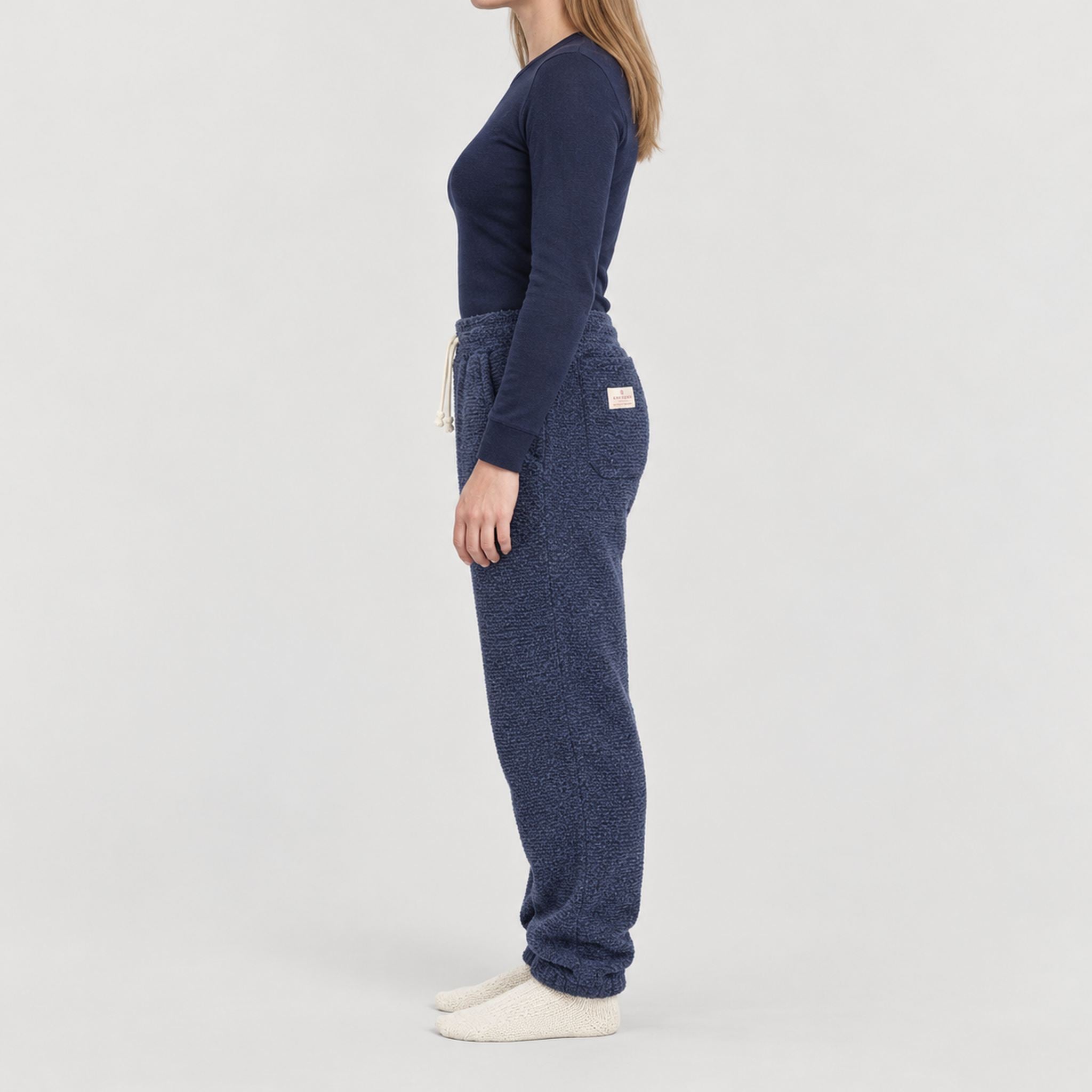 Amundsen Hut Pants in Faded Navy, side view on model.