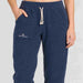 Amundsen Hut Pants in Faded Navy, close-up fabric detail on model.