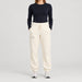 Amundsen Hut Pants in Oatmeal, front view on model.