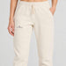 Amundsen Hut Pants in Oatmeal, close-up fabric detail on model.