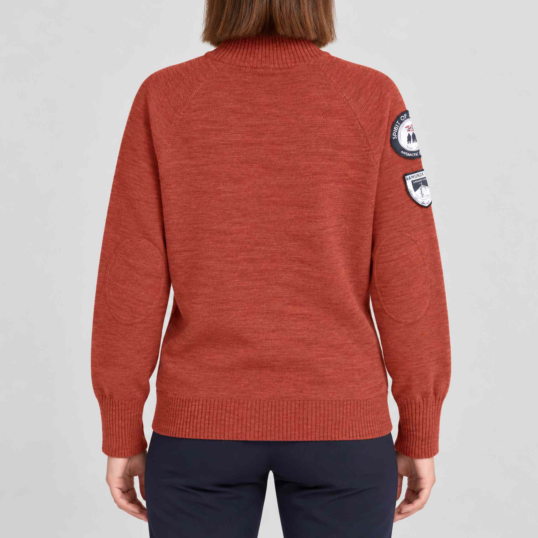 Amundsen Peak Half Zip in Terra Red, back view on model.