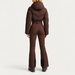 Cordova women's Ajax Ski Suit in Chocolate – model back view – London Ski Co
