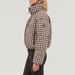 Cordova women's Cortina Ski Jacket in Chocolate Gingham – model side view – London Ski Co