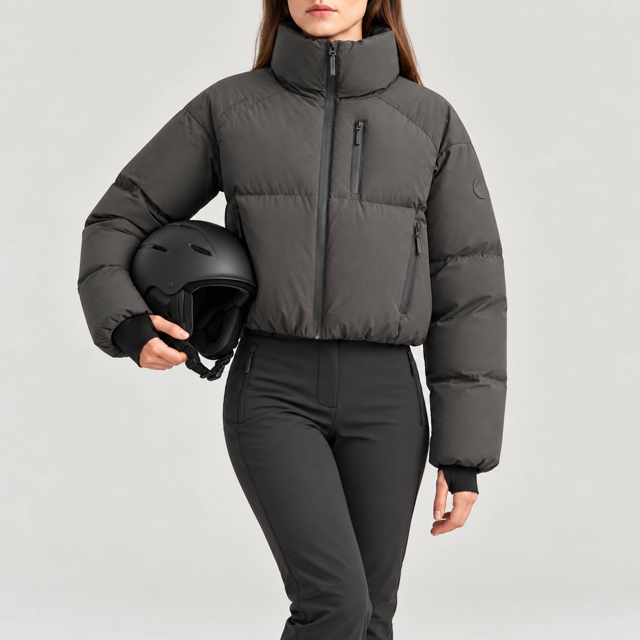 Cortina Ski Jacket in Anthracite — helmet pose