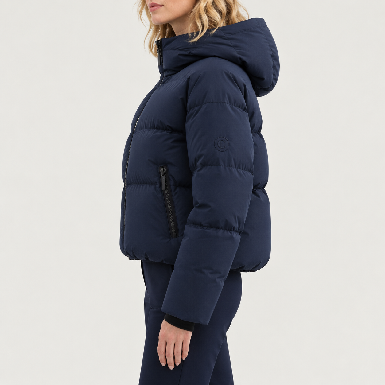Cordova women's Meribel Ski Jacket in Indigo – model side view – London Ski Co