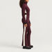 Cordova women's OTB Ski Suit in Bordeaux – model side view – London Ski Co